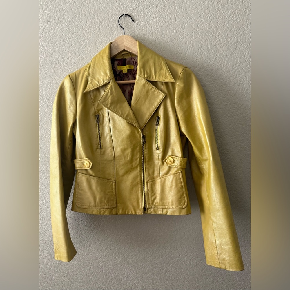 Very fun yellow jacket with a purple inside for a pop of color.